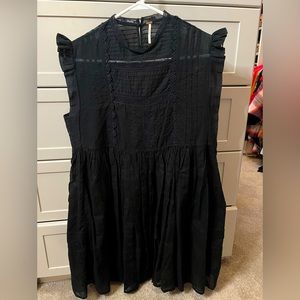 Black FREE PEOPLE sheer, embroidered, pleated delicate detail sleeveless dress.